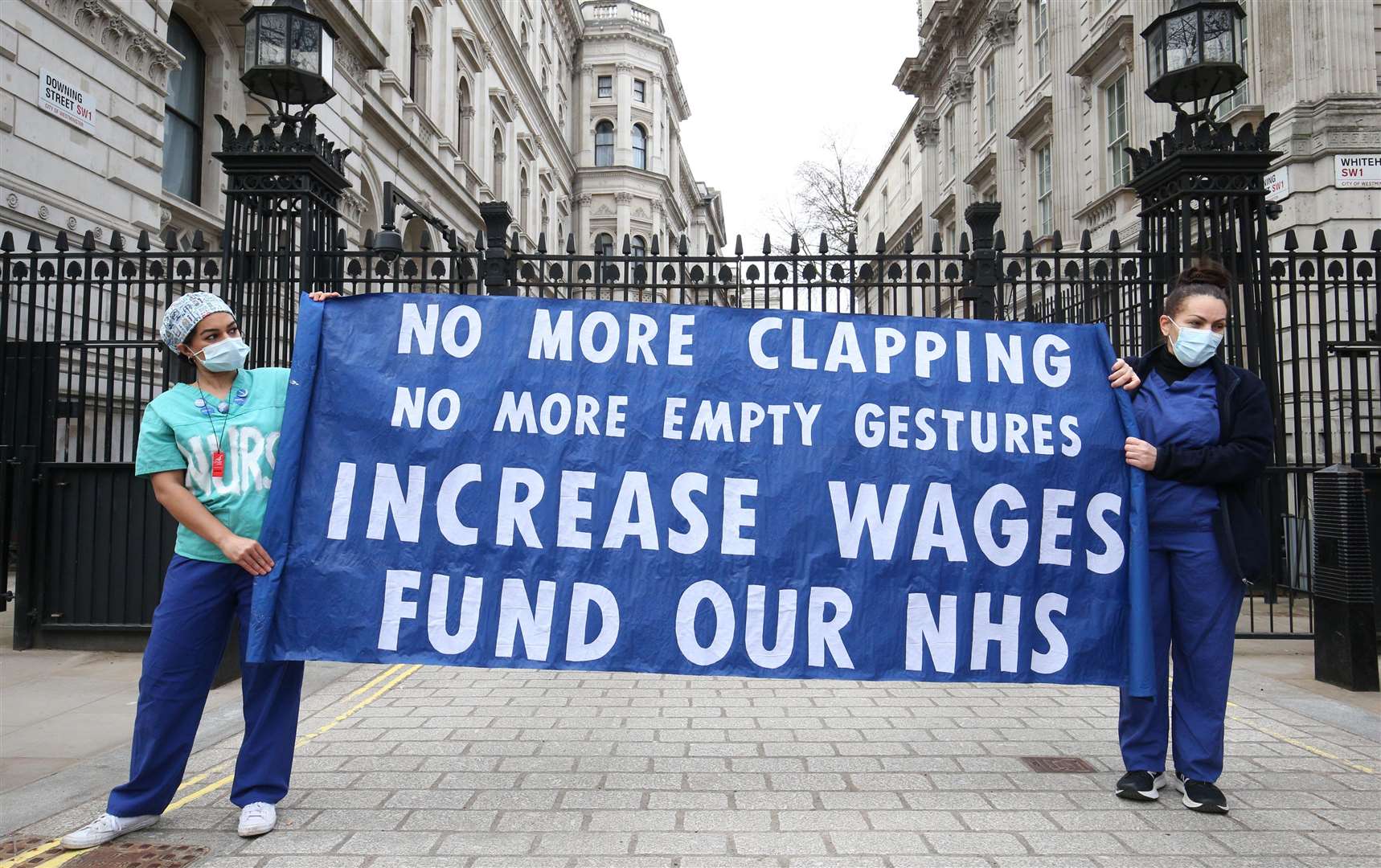 Nurses and NHS workers from the campaign group NHS Workers Say No protest about pay outside Downing Street (Jonathan Brady/PA)