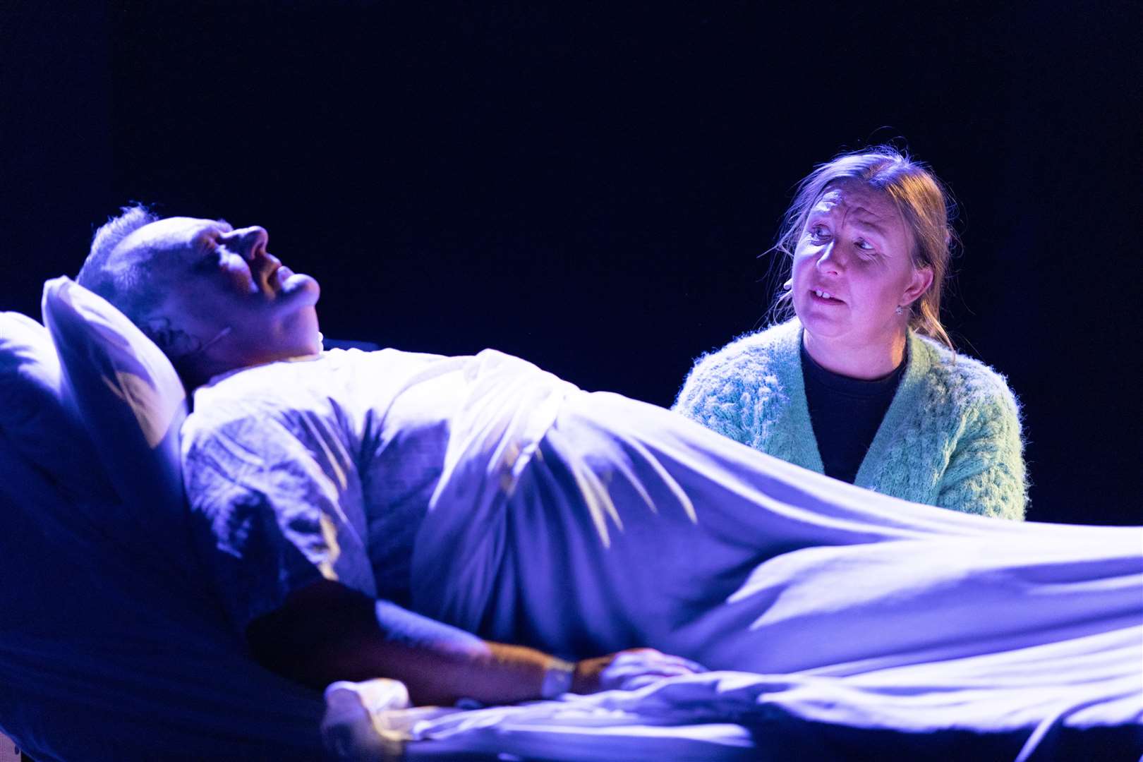 Amanda Luscombe-Smith as Jean, sings her heart out at the bedside of husband Rab (Gerry Sutton). Picture: Brodie Young