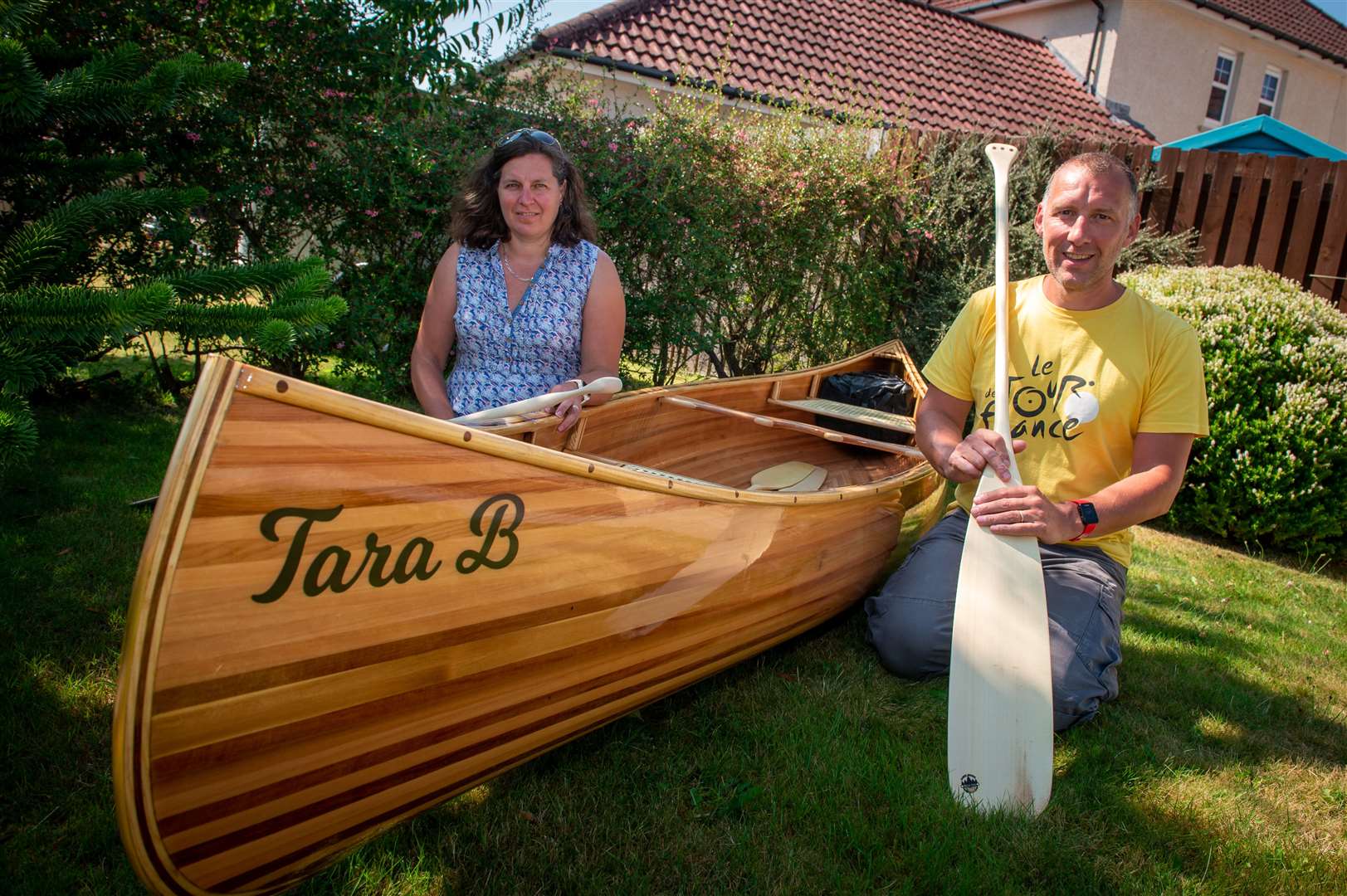 Donnie Bruce has severe sciatica and has been signed off work since January. He used the time to build a Canadian Canoe - calling it after his wife Tara.. .Tara and Donnie Bruce...Picture: Callum Mackay..