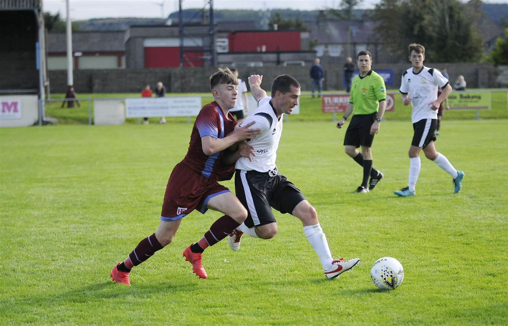 Clach's Blair Lawrie keeps Nathan McKeown behind him.. .Keith FC v Clachnacuddin FC at Kynoch Park...Picture: Becky Saunderson..