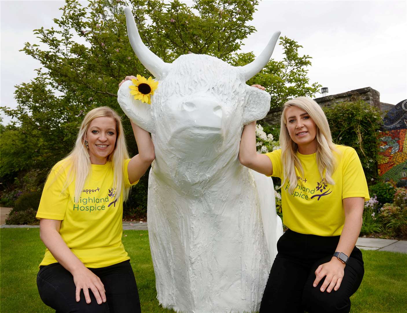 Highland Hospice are looking for artists to decorate the Highland Coo Trail sculptures. Jenna Hayden, left, events fundraiser and Karen Duff, corporate fundraiser, with first Coo. Picture: Gary Anthony