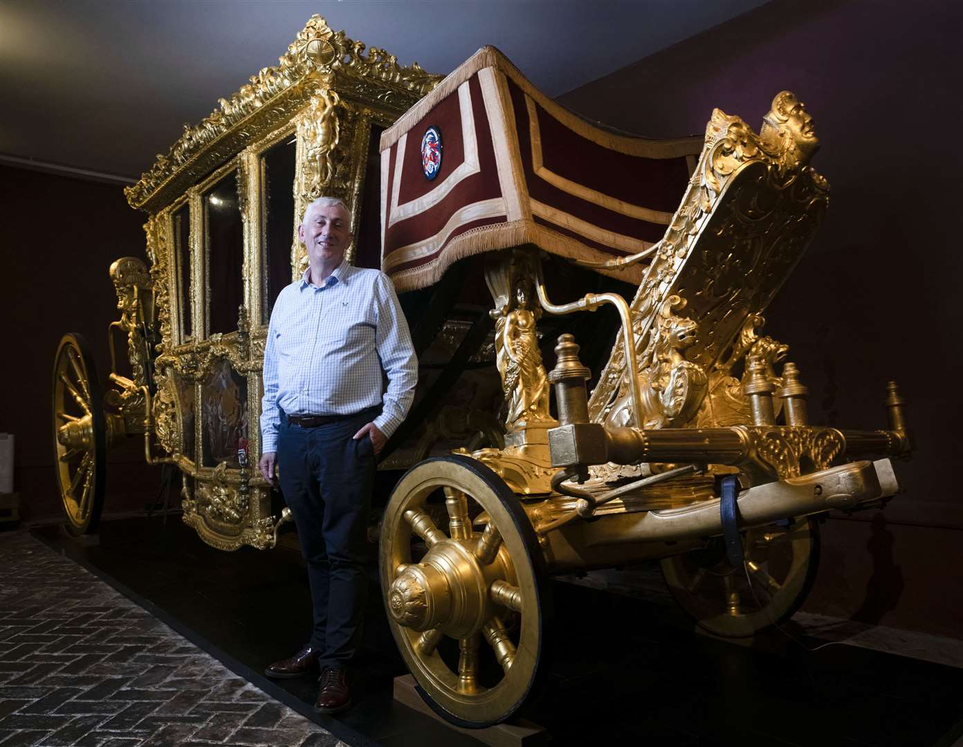 Sir Lindsay Hoyle, the Speaker of the House of Commons, with the historic Speaker State Coach (Steve Haywood/UK Parliament/PA)