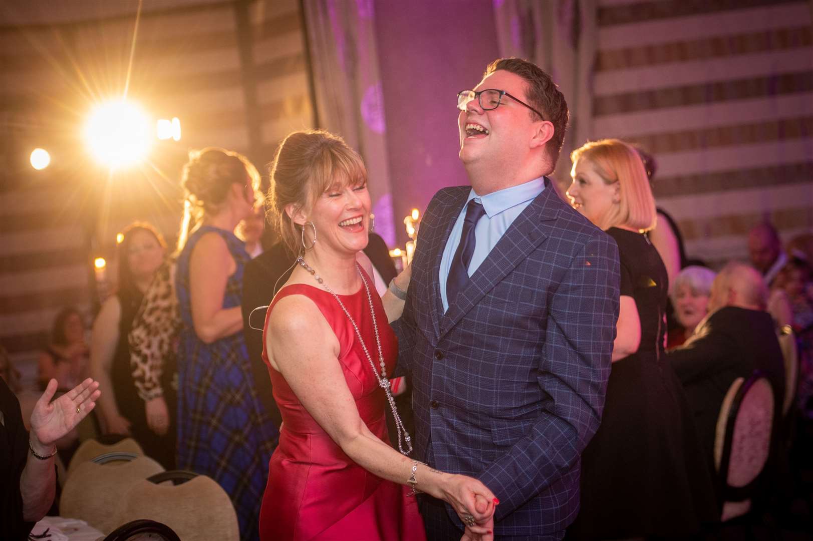 Event host Nicky Marr cuts the rug with HNM's Darrel Paterson. Picture: Callum Mackay