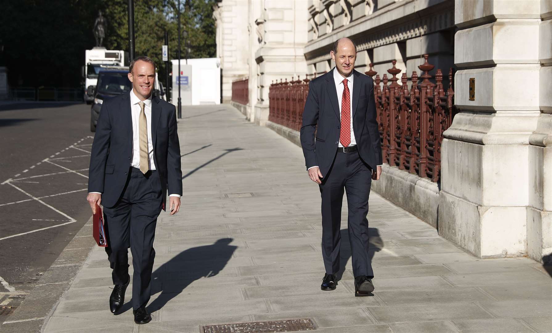Foreign Secretary Dominic Raab arrives with new permanent under-secretary Philip Barton at the newly named Foreign, Commonwealth and Development office in King Charles Street, Westminster (Alastair Grant/PA)