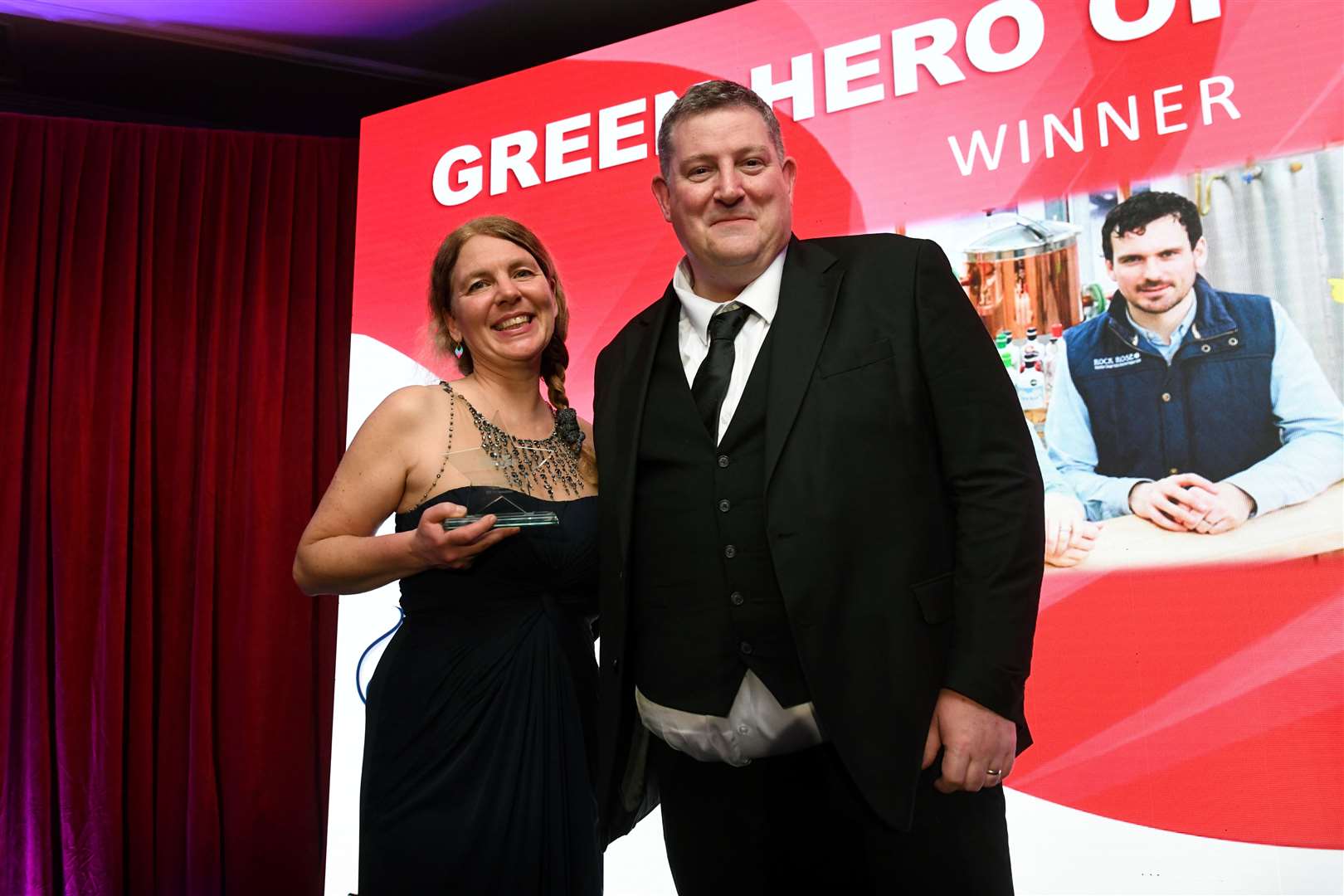 Gaelle Delagrave accepted the 2023 green hero award on behalf of Martin and Claire Murray of Dunnet Bay Distillery. Picture: James Mackenzie
