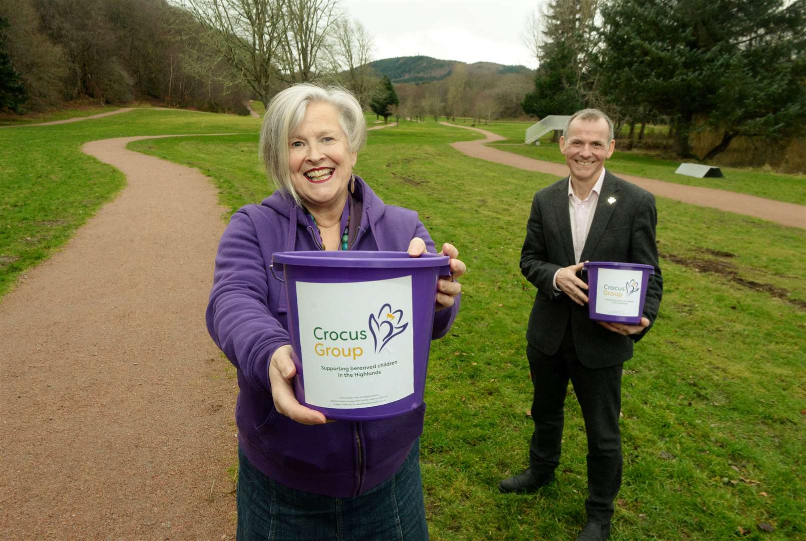 Julia McKillop, Crocus Group Childhood Bereavement Coordinator and Andrew Leaver, Highland Hospice Fundraising Manager in front of the patch of grass where the crocuses will be planted. Picture: James Mackenzie