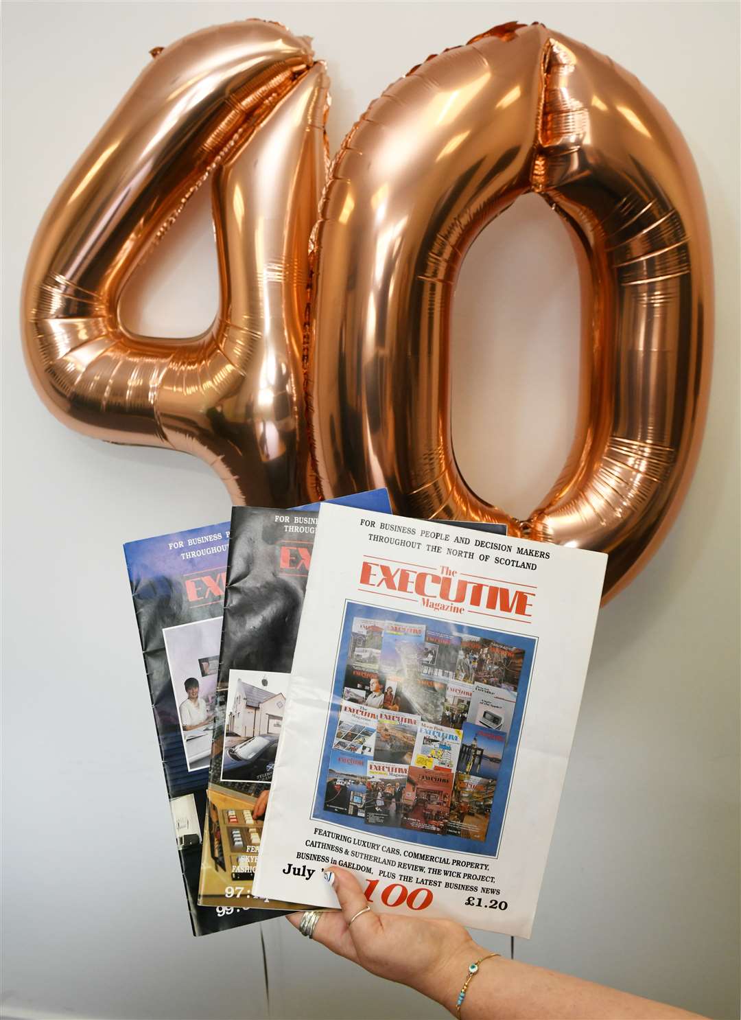 Executive magazines in front of "40" balloons. Picture: James Mackenzie.