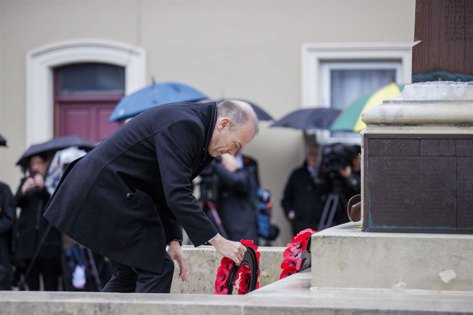 Northern Ireland Secretary Chris Heaton-Harris lays a wreath (Liam McBurney/PA)