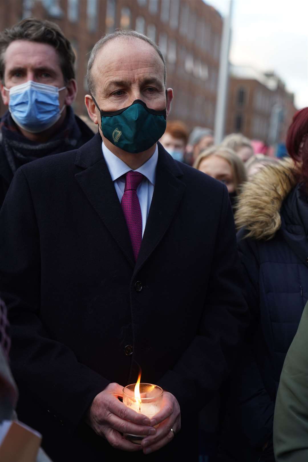 Taoiseach Micheal Martin attends the vigil at Leinster House, Dublin (Brian Lawless/PA)