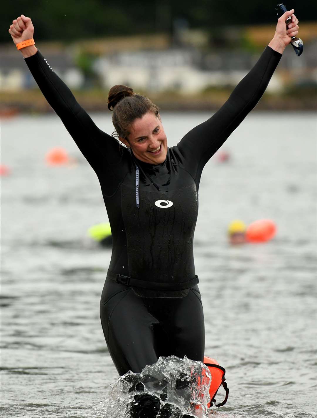 One woman celebrates completing the swimming challenge. Picture: James Mackenzie