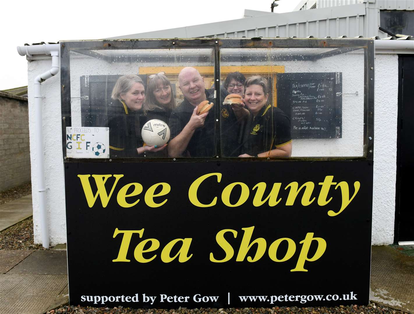 Nairn County Football Club and their pie in a roll which is being served up at the tea hut...Debbie Smith, Kay Wilson, Ian Finlayson Club Secretary, Doreen Spark and Cindy Milne..