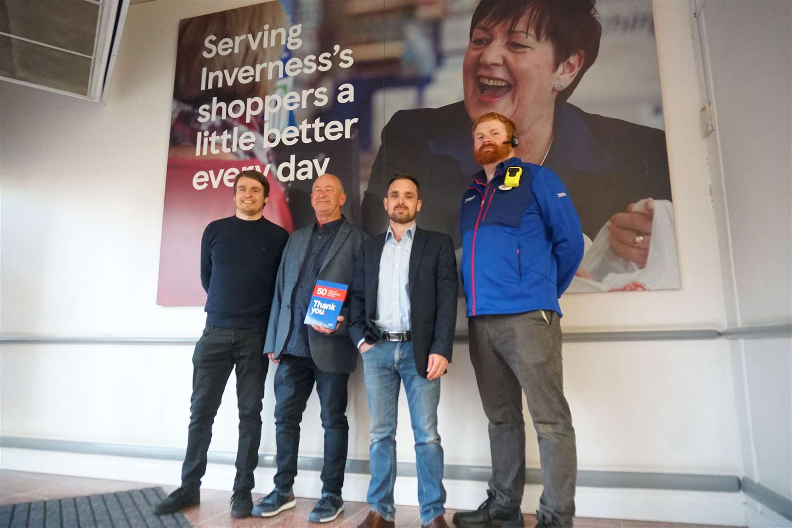 Tesco managers Terry Rosie, Matthew Johnstone and Andrew Campbell with Sandy Mackenzie. Picture: Federica Stefani.