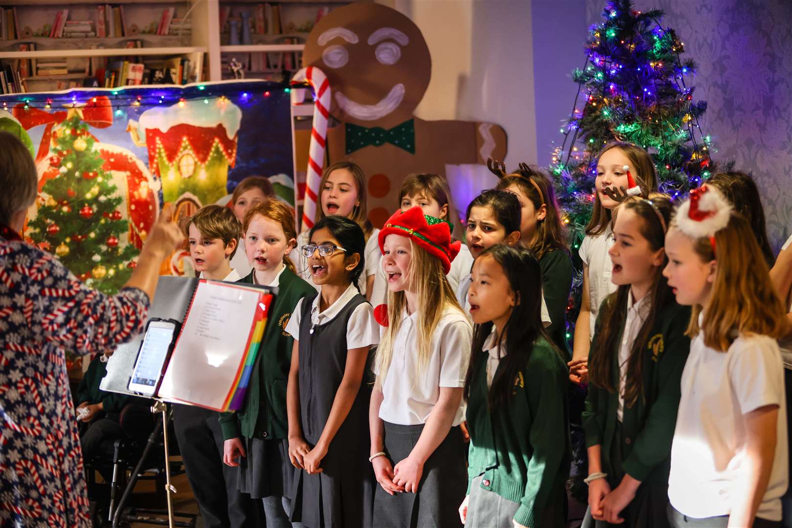 Children from Whiteley primary school singing carols at Hamble Heights care home, operated by Encore Care Homes (Hamble Heights/PA)