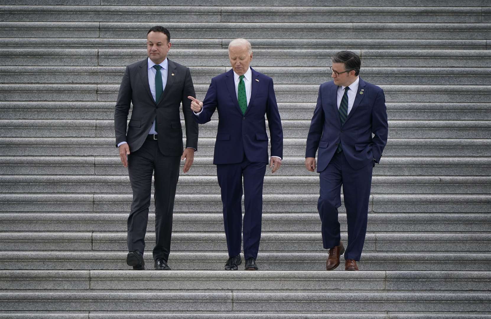 Taoiseach Leo Varadkar, US President Joe Biden, and Speaker Mike Johnson leave after the annual Friends of Ireland Luncheon on Capitol Hill (Niall Carson/PA)