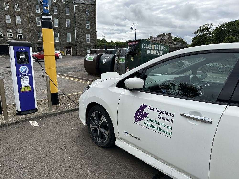 An EV and EV charge point in Wick, Caithness.