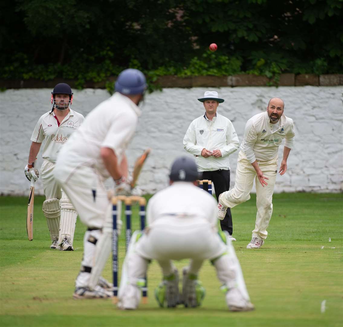 Northern Counties bowler Daniel Johns delivers to Highland's Rob Nixon in the first league derby earlier this season. Picture: Callum Mackay. Image No.044499.