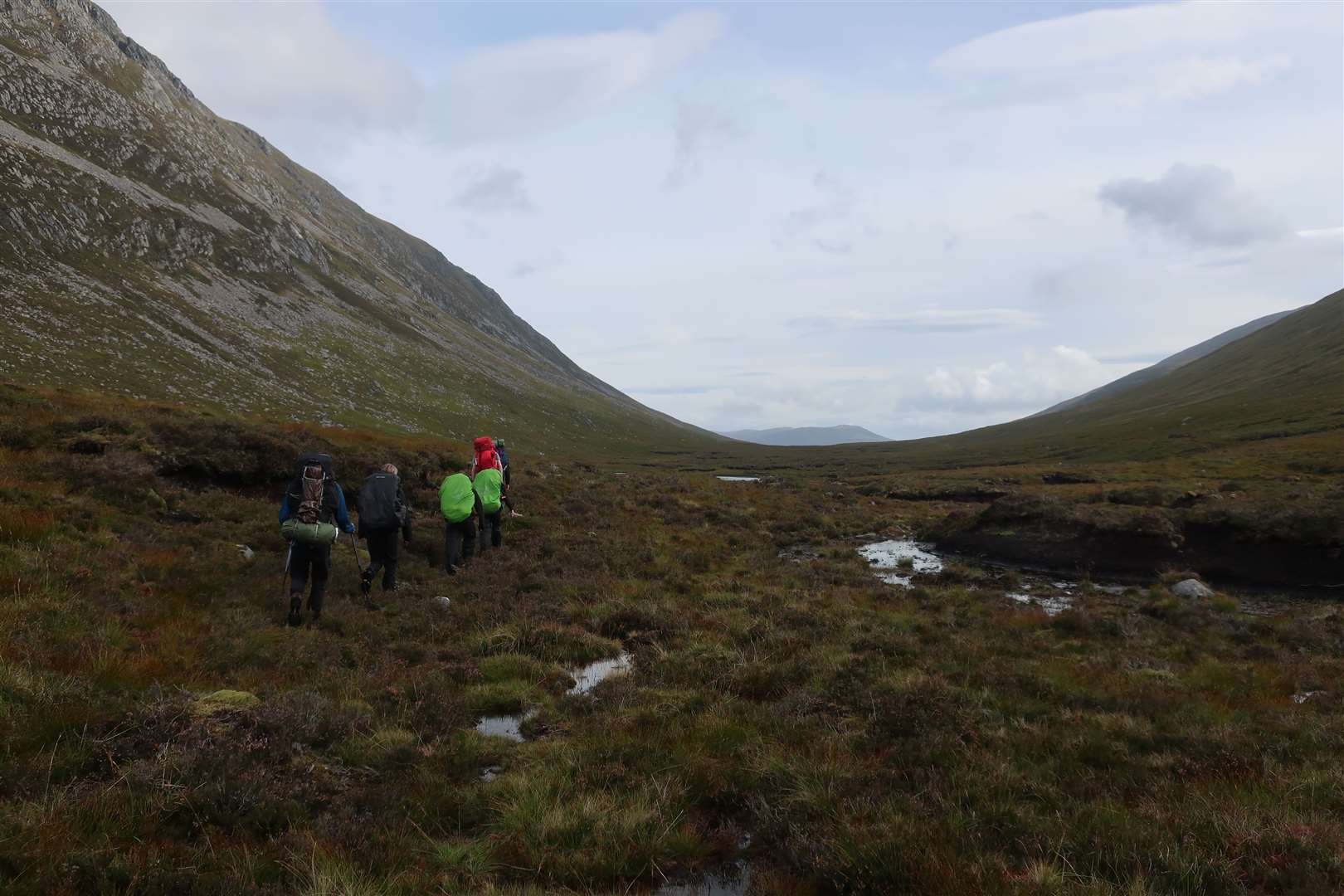 The groups found it hard work crossing the peat hags.