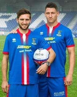 Josh Meekings (right) and Graeme Shinnie show off Caley Thistle's new strip. Picture by Ken Macpherson.