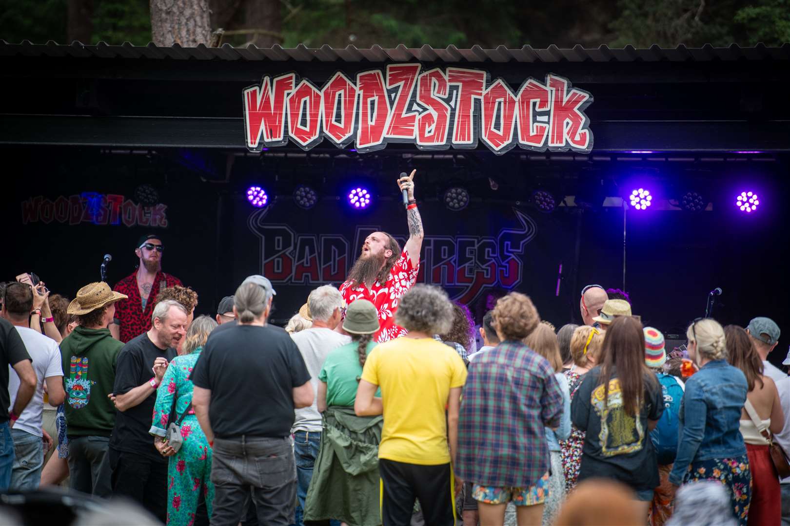 New Bad Actress singer Toby Michaels (centre) in front of Woodzsock's main stage crowd. Picture: Callum Mackay