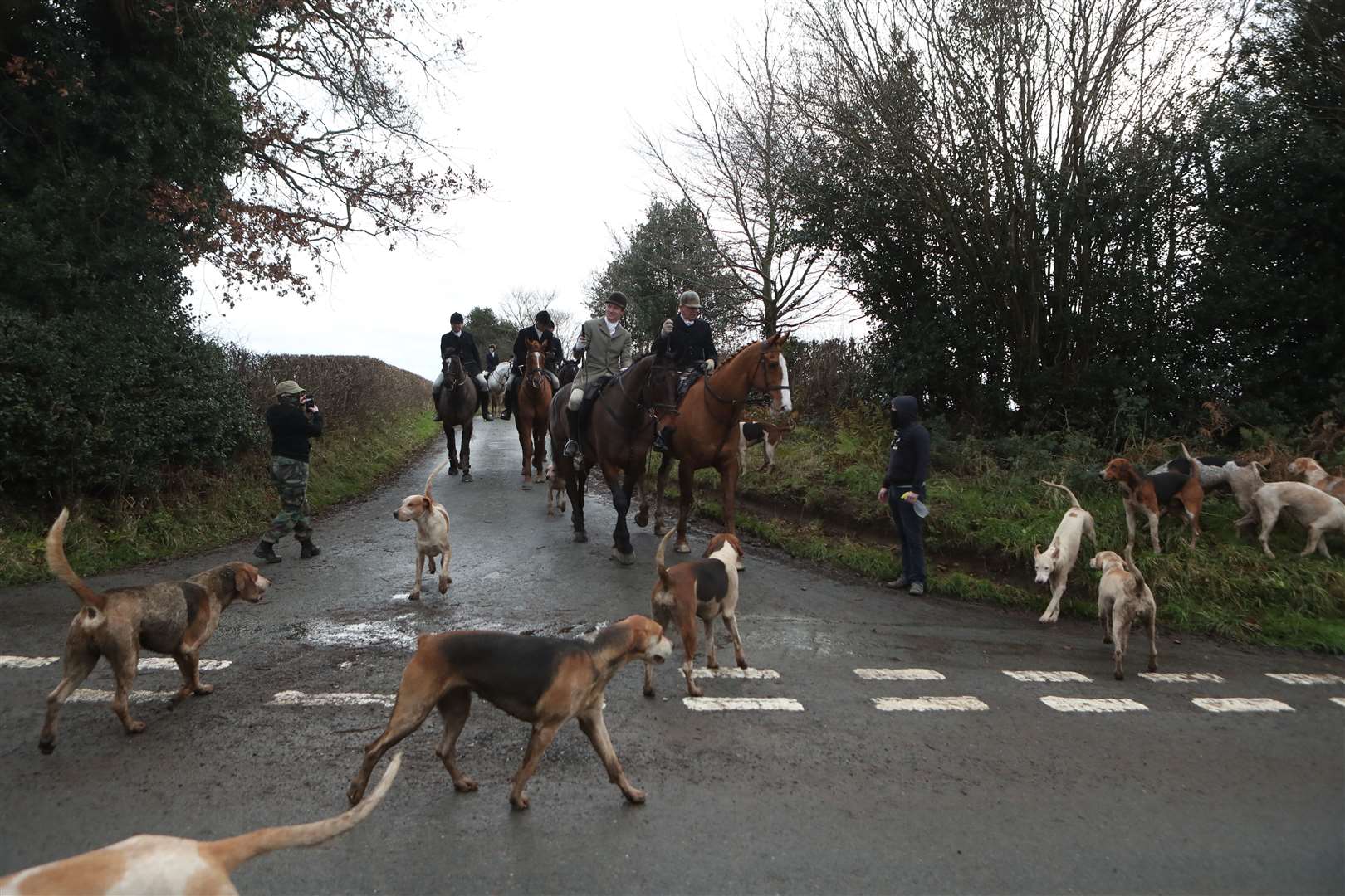 Hunt saboteurs photograph a Boxing Day Hunt near Husthwaite, North Yorkshire (Danny Lawson/PA)