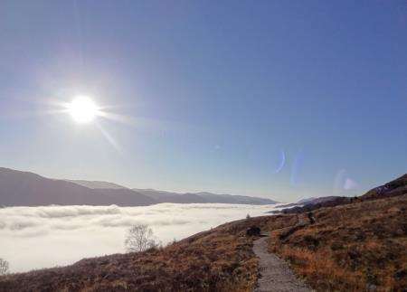 The new path which makes up part of the high level Great Glen Way between Invermoriston and Fort Augustus, with Loch Ness covered in cloud below.