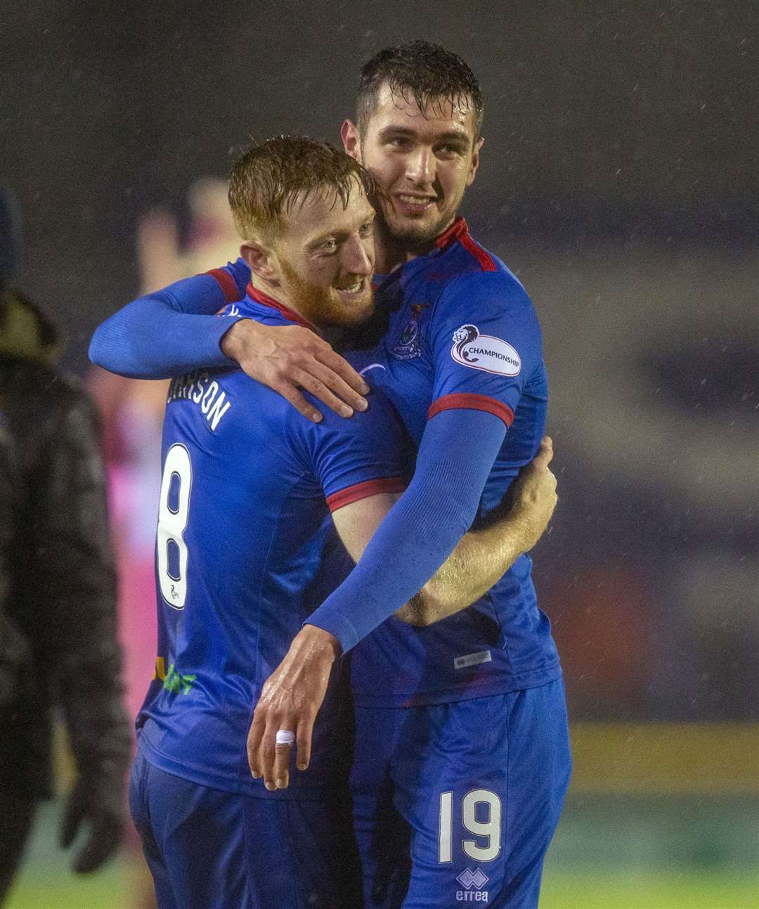 Nickolay Todorov and David Carson celebrate Caley Thistle reaching the cup final. Picture: Ken Macpherson
