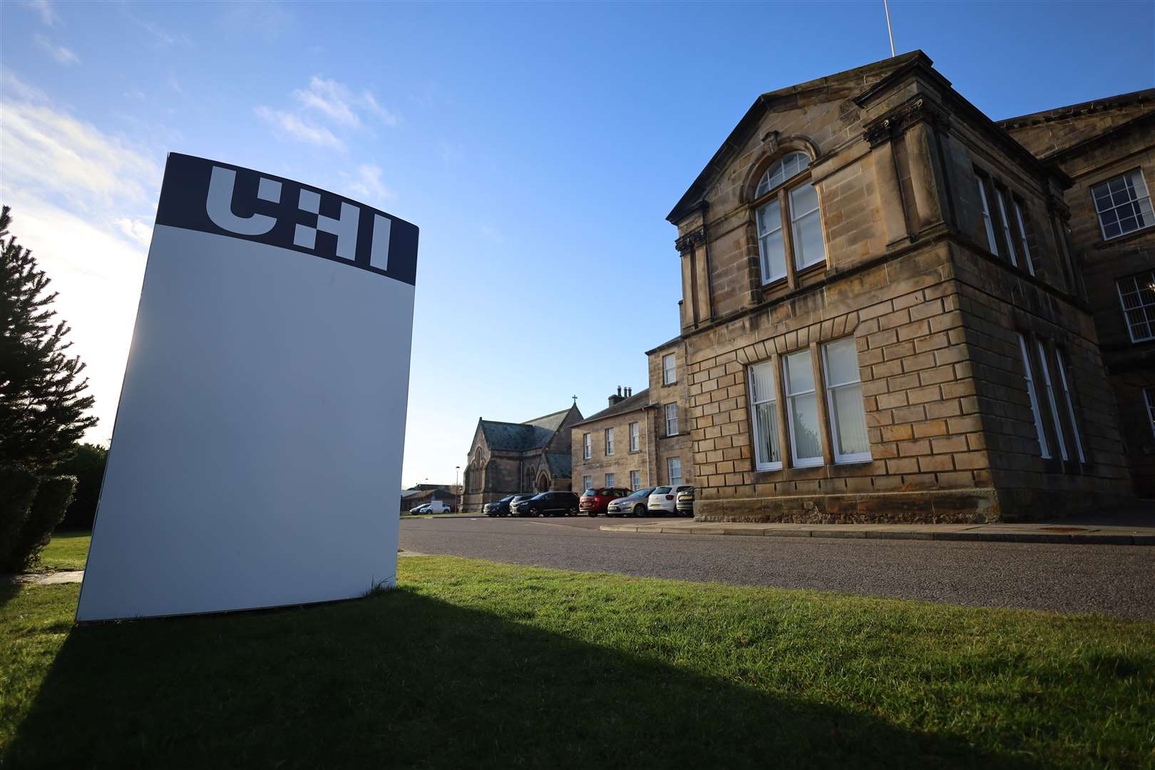 Staff in UHI's Executive Office, based until recently on Inverness's riverside, are to be balloted on industrial action.