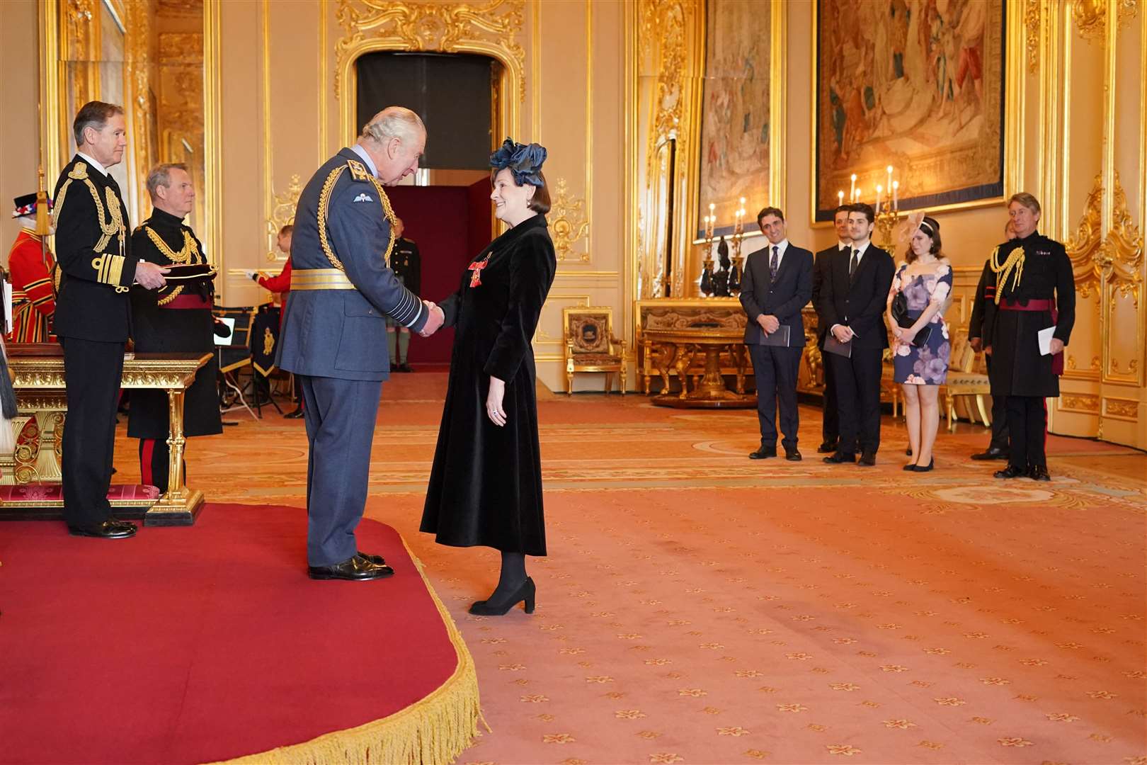 Mrs Heidi-Louise Thomas McGann receives her honour from the King (Jonathan Brady/PA)