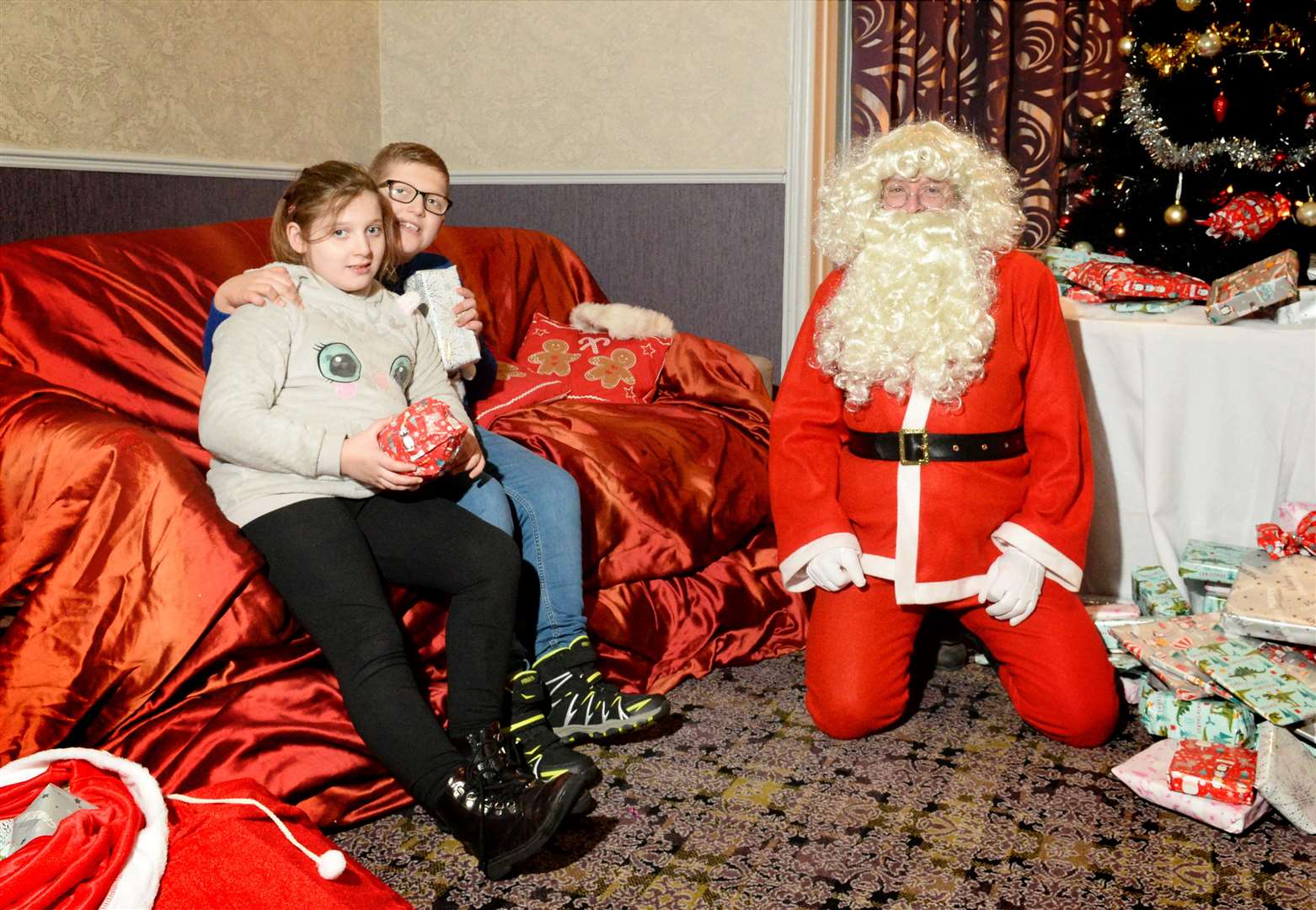 Beaufort Hotel Christmas Charity Bash for Mikeysline and MFR Cash for Kids..Emily and Jacob Akacka were delighter to meet Santa..Picture: James Mackenzie..