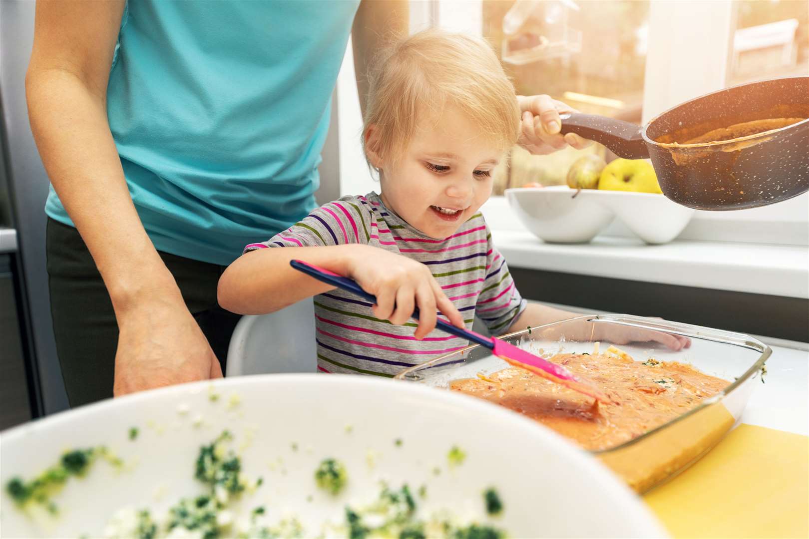 Get the family involved in preparing a meal.