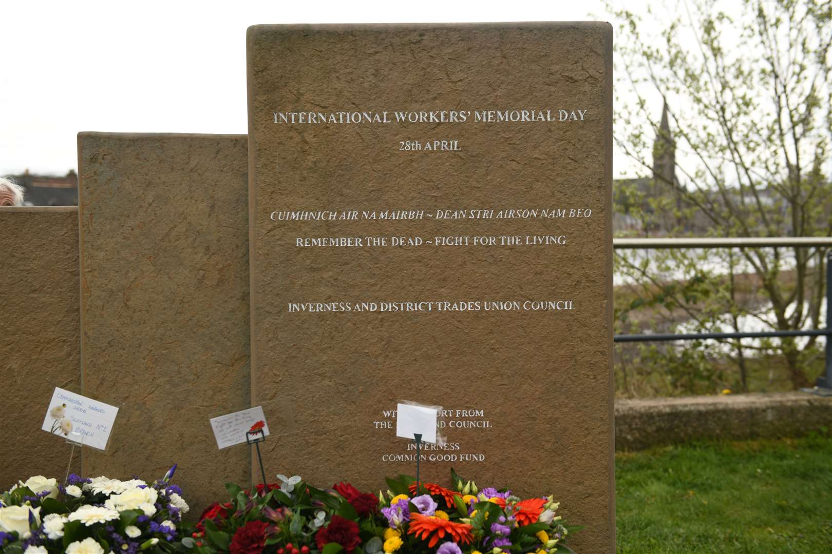 The Inverness workers' memorial by the River Ness was the focus of a ceremony to mark International Workers' Memorial Day.