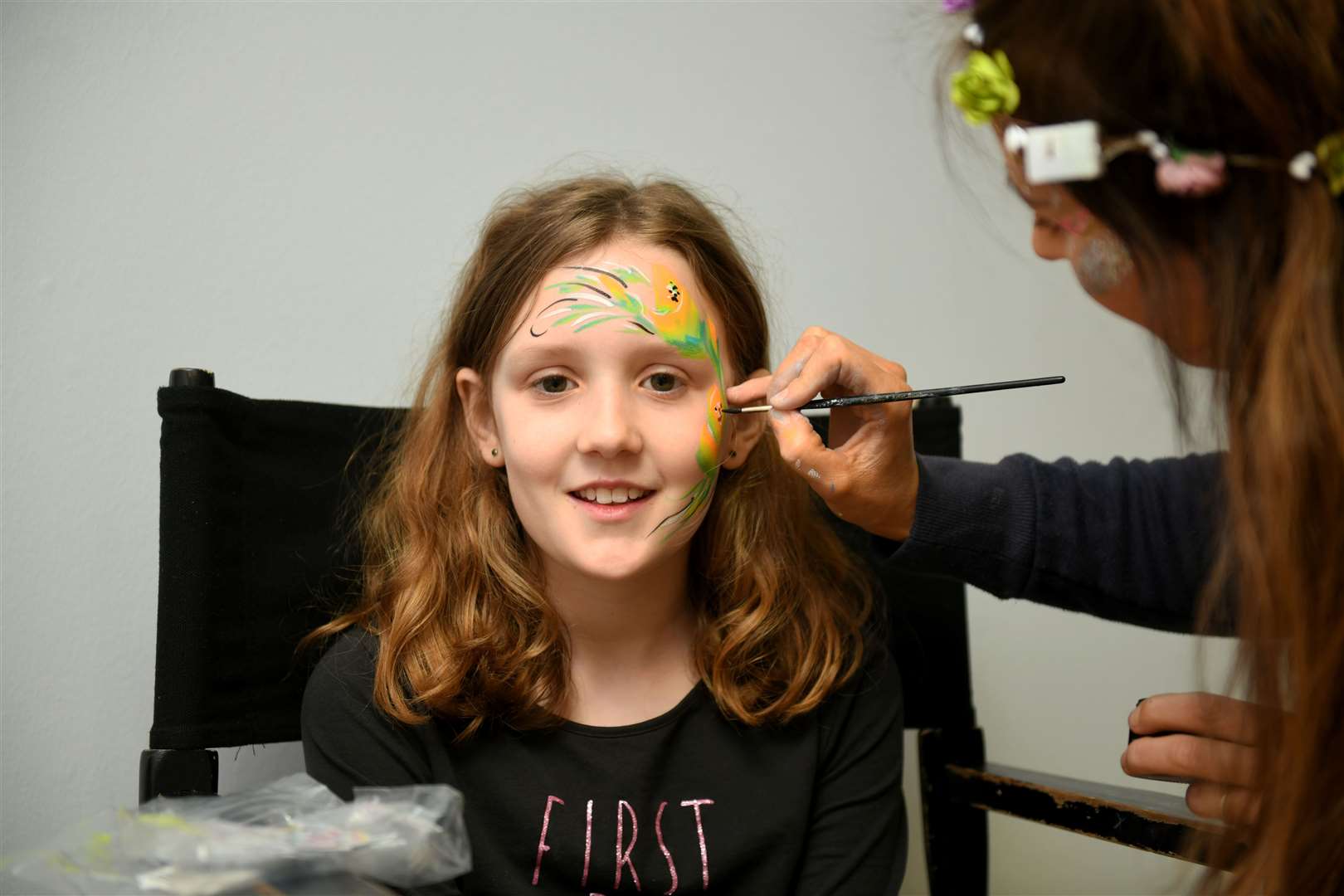 Chloe McIvor getting her face painted. Picture: James Mackenzie.