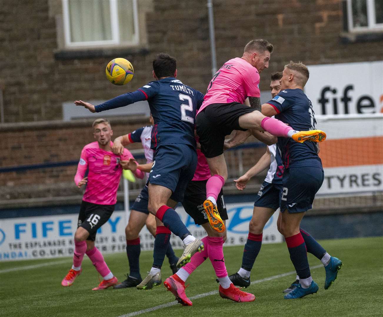 Caley Jags forward Michael Gardyne tries to rise above a crowd in the box to win a header at Raith. Picture: Michael Schofield