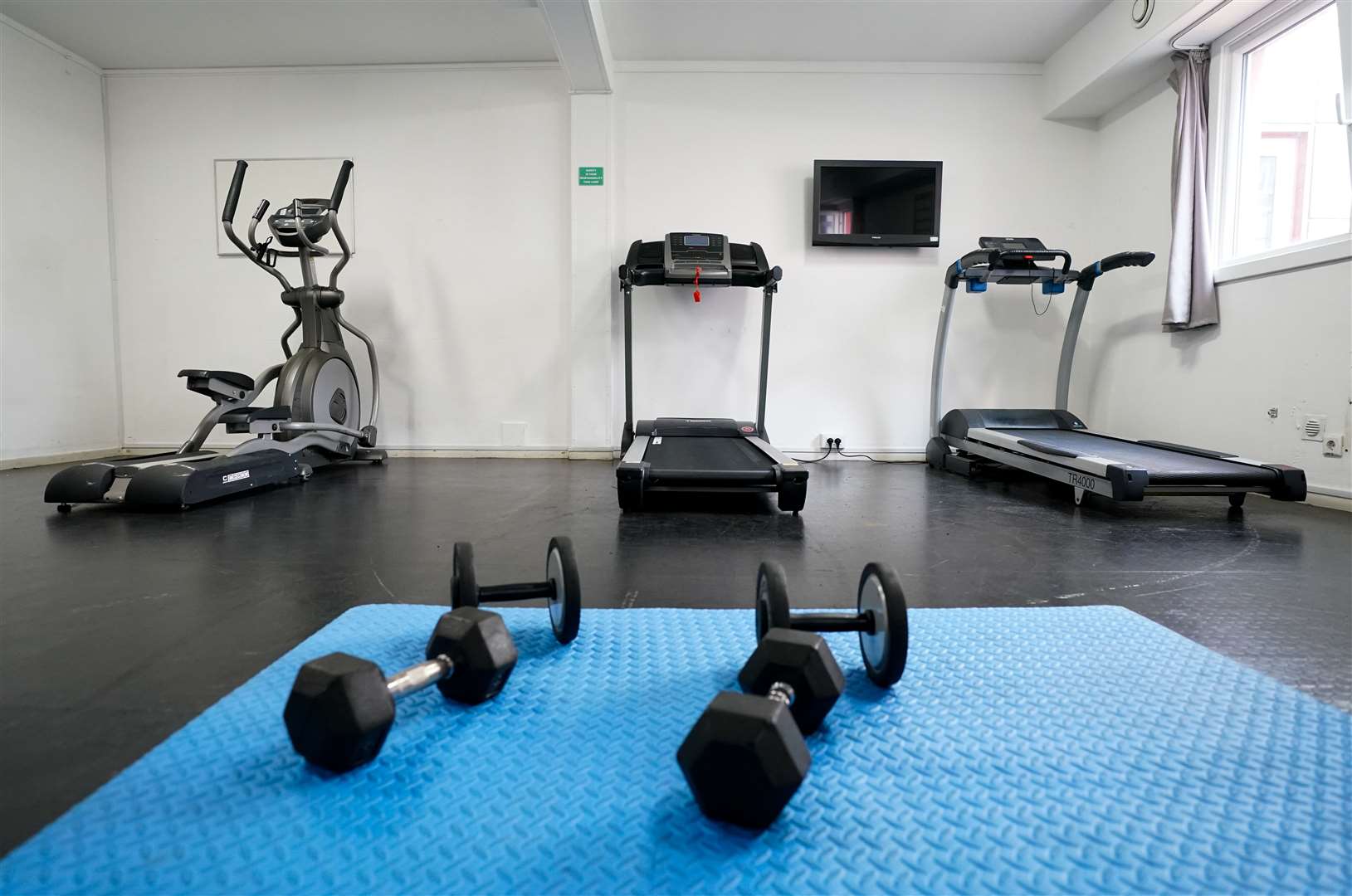 Migrants will be able to use a gym equipped with treadmills, weights and exercise bikes (Andrew Matthews/PA)