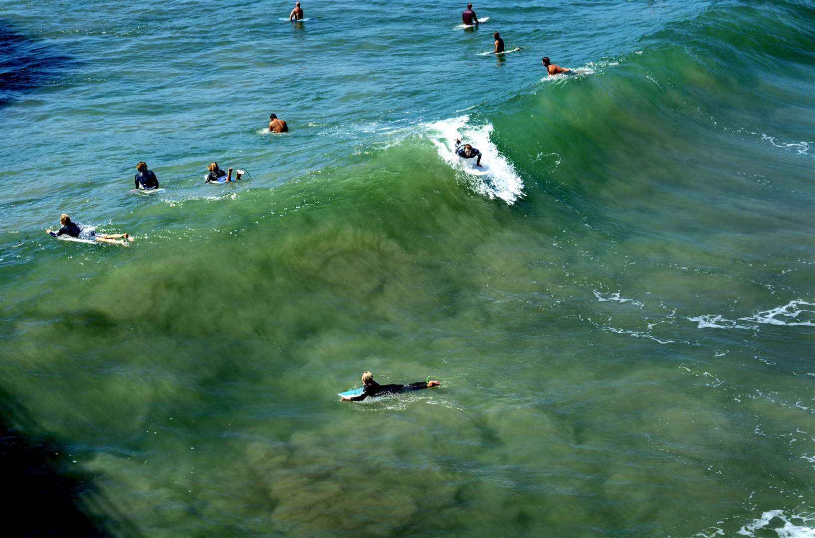 A surfer riding a wave in Huntington Beach. Picture: iStock/PA