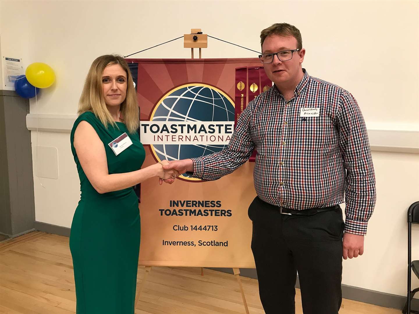 Inverness Toastmasters Club president Pamela Williams with area director Daniel Doherty at the anniversary event.