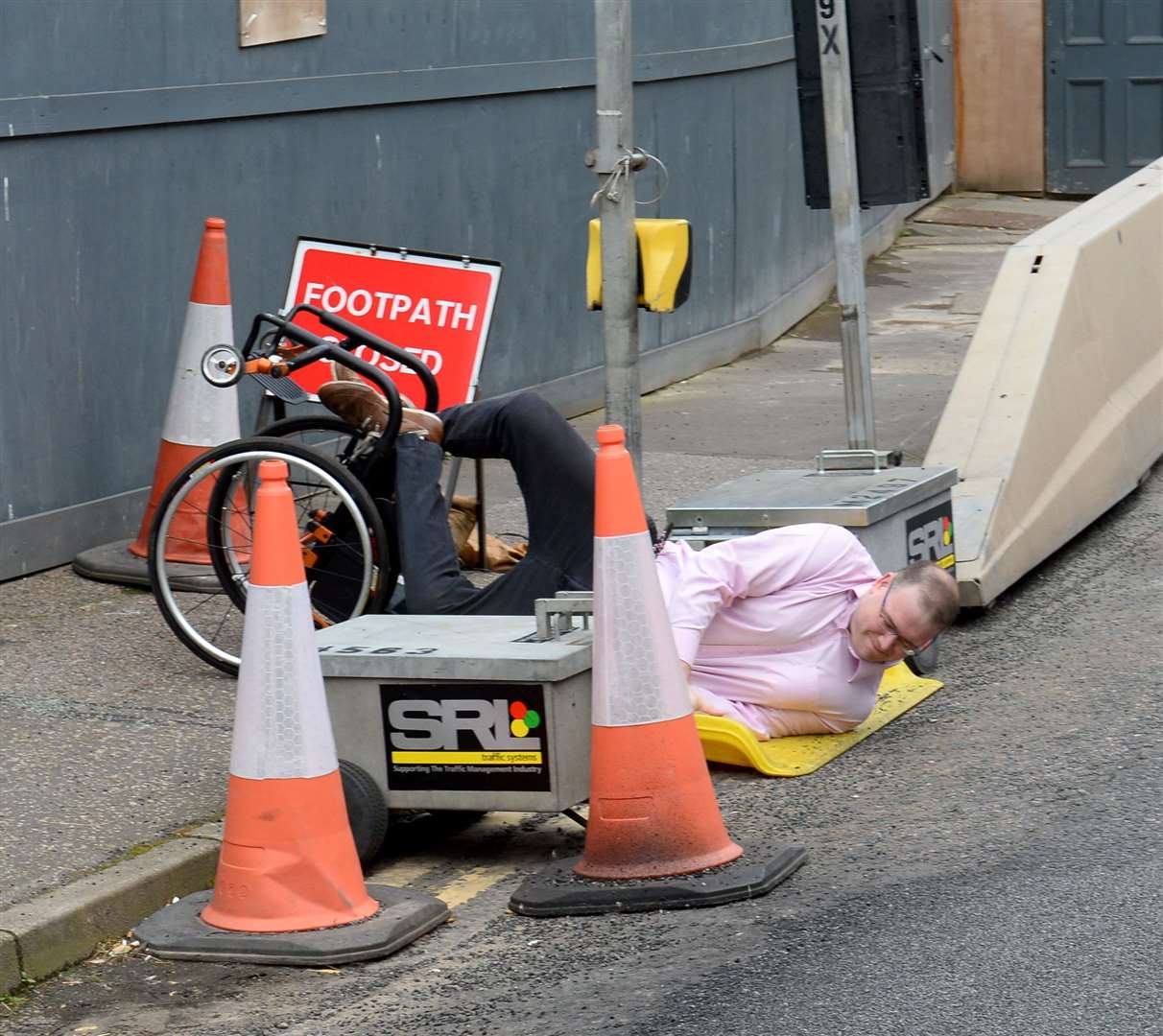 Councillor Andrew Jarvie toppled over while negotiating a temporary ramp in Castle Street.