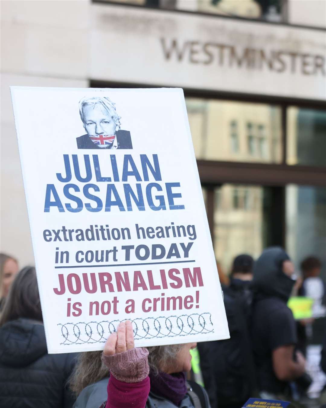 Supporters of Wikileaks founder Julian Assange protest outside Westminster Magistrates’ Court (PA)