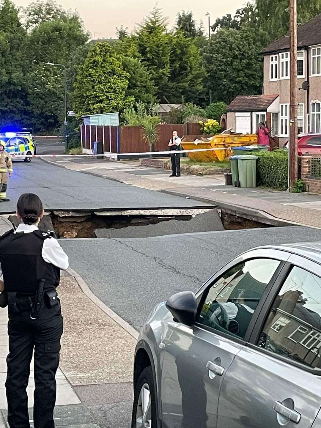 Liam Edwards, 25, who lives on Leysdown Avenue, said he heard a ‘massive thud’ as part of the road next to his collapsed (Liam Edwards/PA)