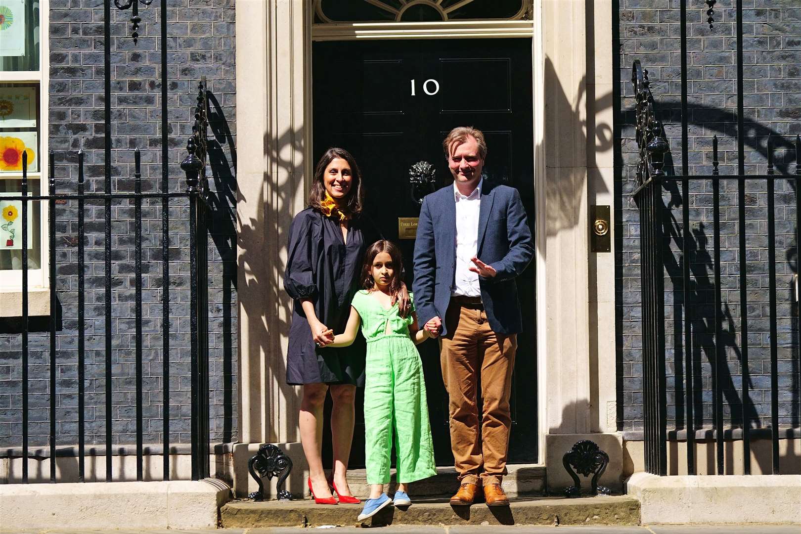 Nazanin Zaghari-Ratcliffe with her husband Richard Ratcliffe and daughter Gabriella as they leave 10 Downing Street, central London, after a meeting with Prime Minister Boris Johnson (Victoria Jones/PA)