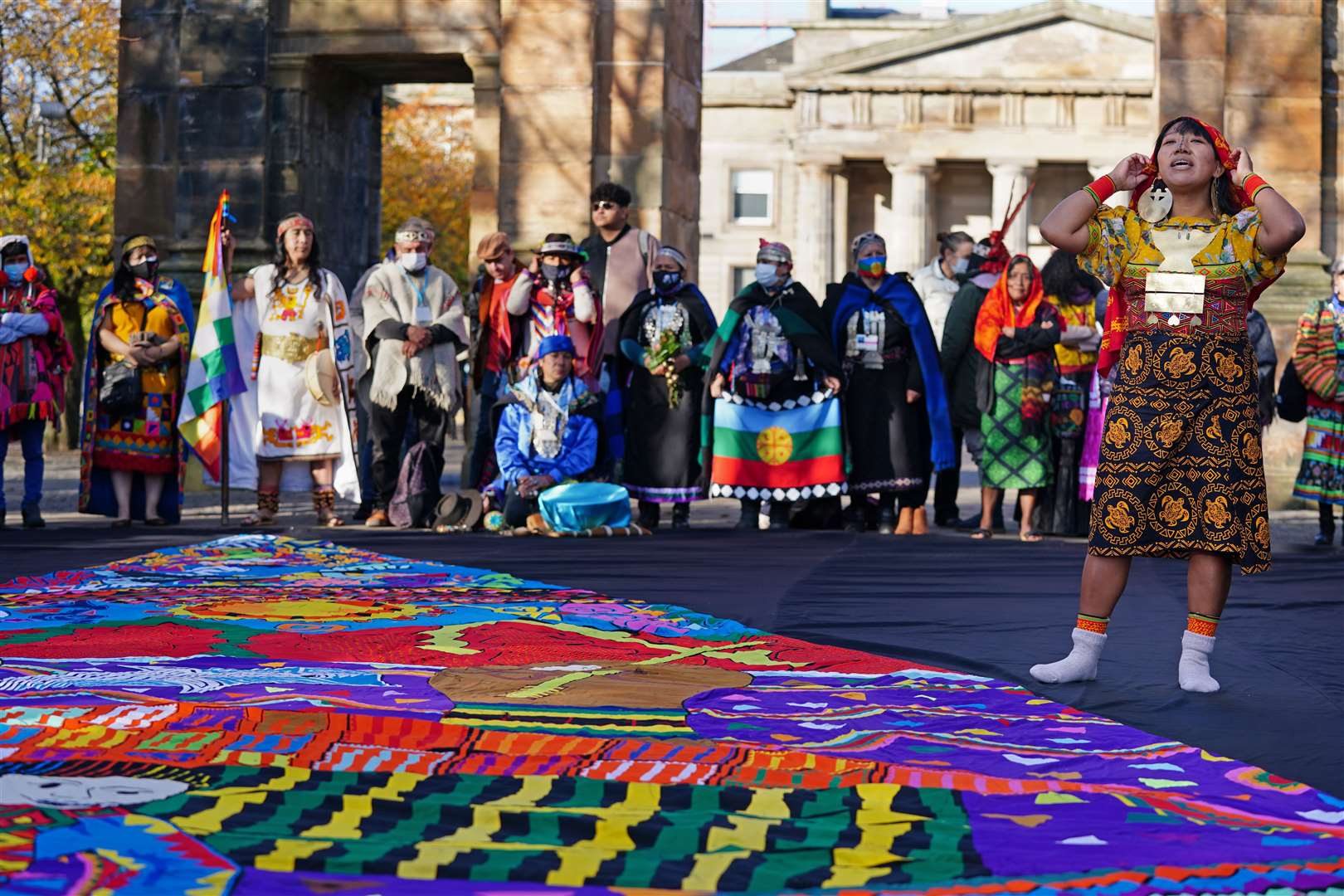 The indigenous peoples brought with them a colourful display as they highlighted their role (Jane Barlow/PA)