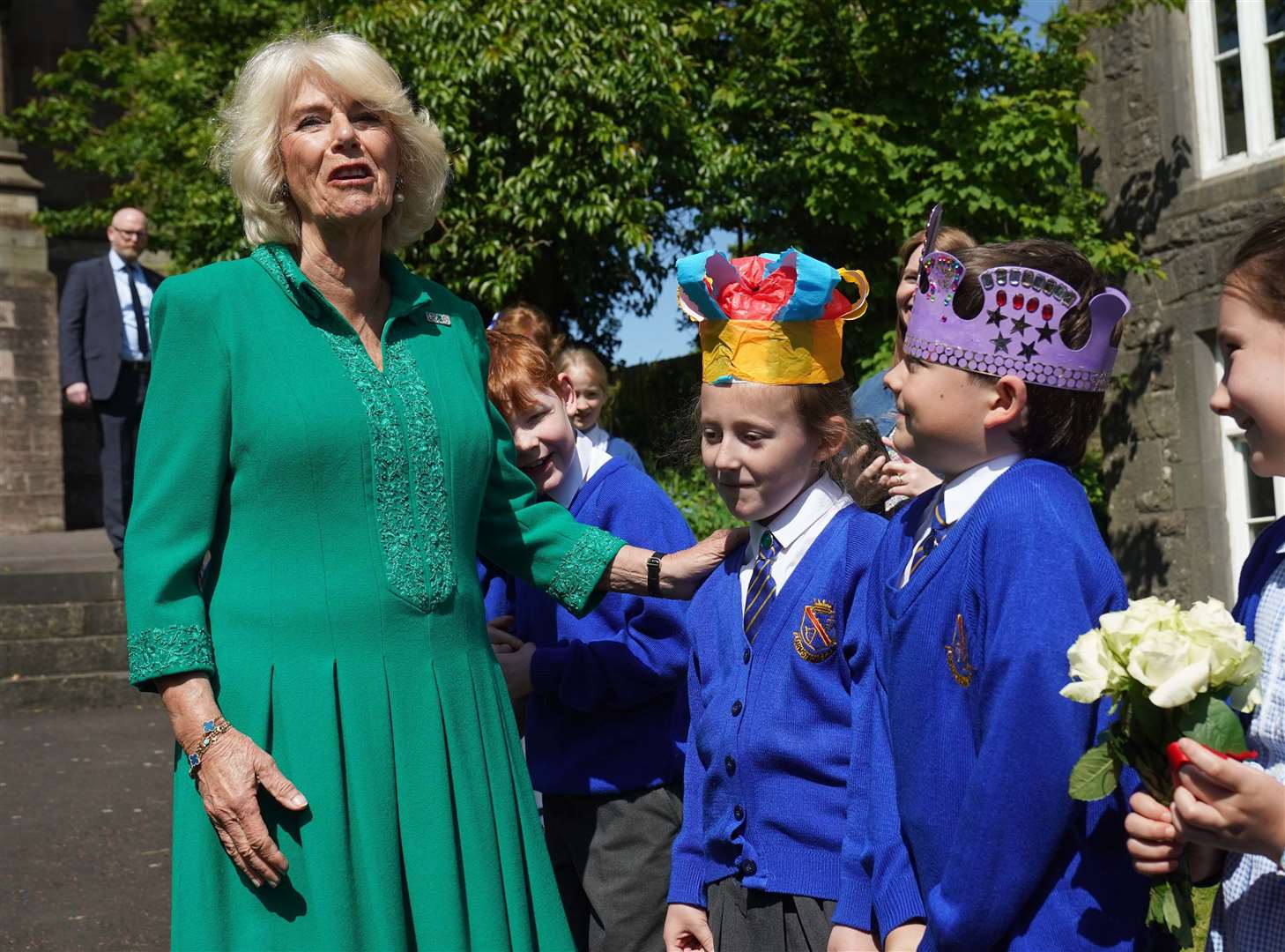 The Queen met Camilla Nowawakowska and Charles Murray, aged eight, outside St Patrick’s Cathedral in Armagh (Brian Lawless/PA)