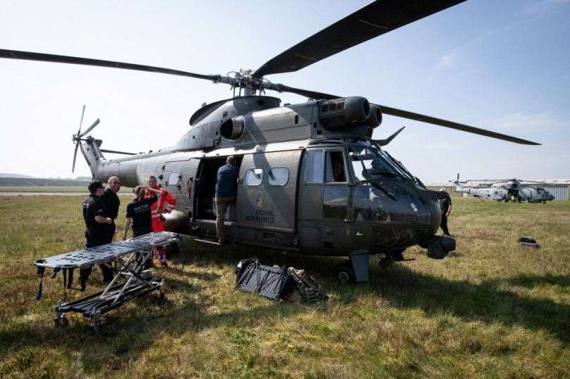 MERCY MISSION: Members of the UK Armed Forces work with NHS medical staff and Air Ambulance Service crews onboard a Puma HC2 helicopter at Thruxton Aerodrome in Andover, England.