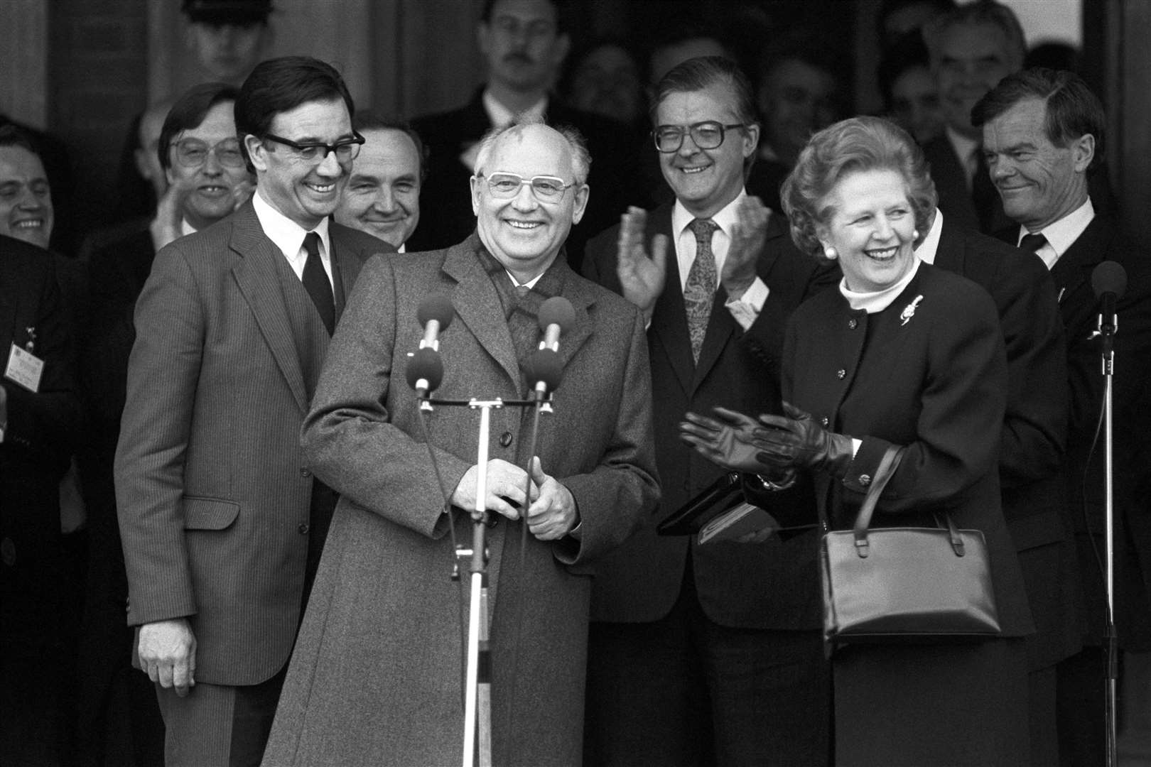 Margaret Thatcher giving enthusiastic applause for Soviet leader Mikhail Gorbachev at RAF Brize Norton (PA)