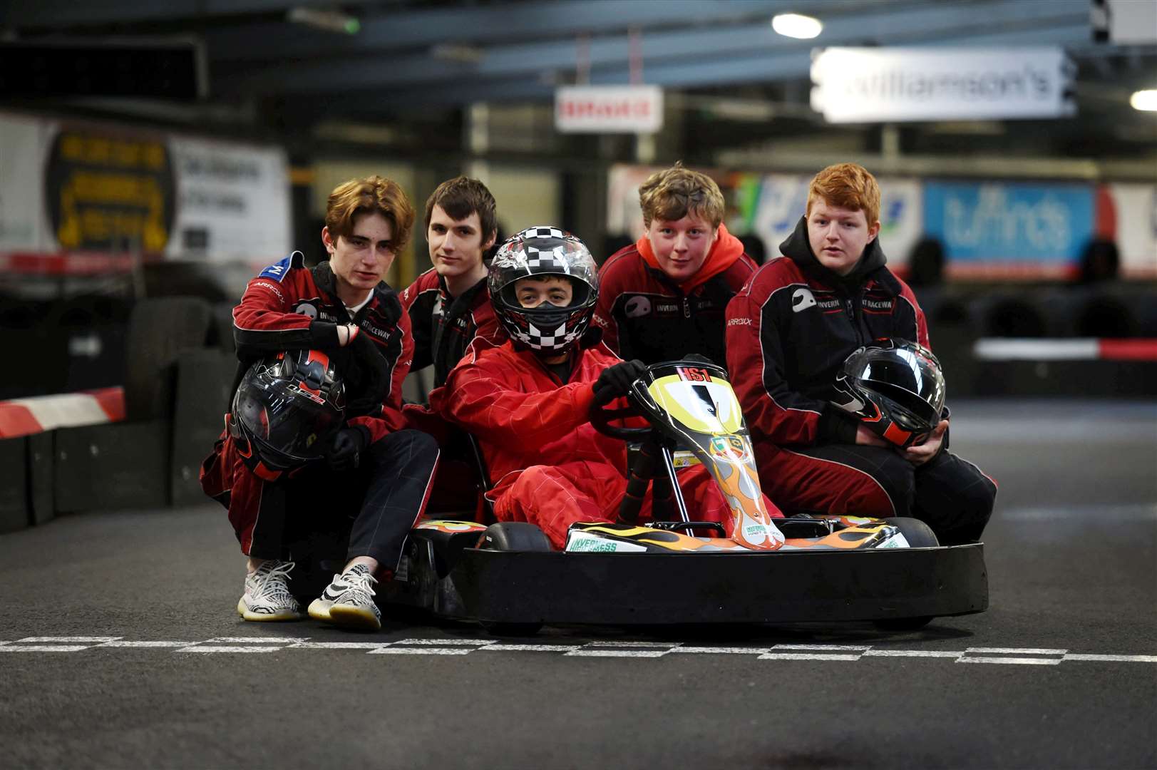 Inverness High School Go-Kart. Senior engineering pupils have built a go-kart with the help of the people at Inverness Kart Raceway...Pupils Finlay Jenkins, Jasiu Podpora, Sam Gladstone, Jay Paterson and Jamie Cooper...Picture: Callum Mackay. Image No..