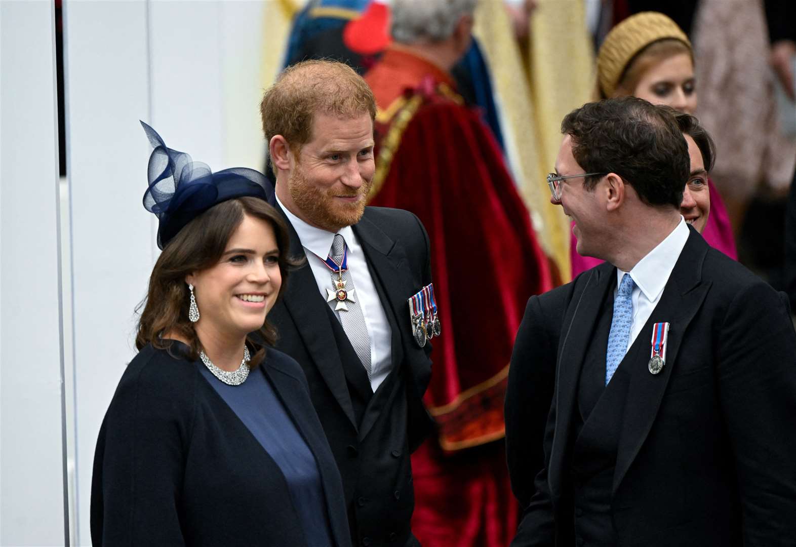 Princess Eugenie and Jack Brooksbank with the Duke of Sussex at Westminster Abbey after the coronation (Toby Melville/PA)
