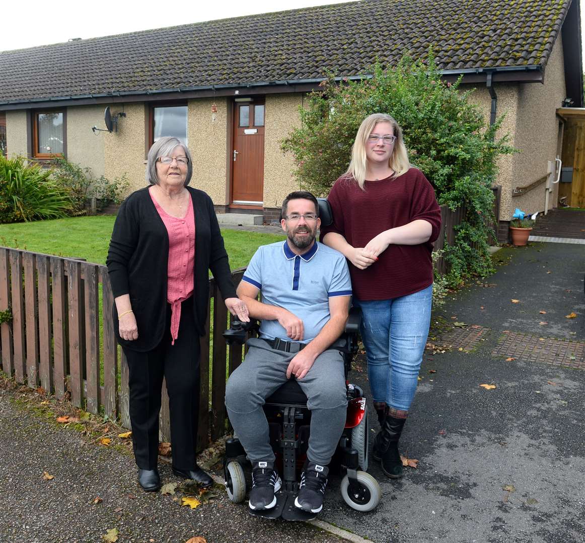 MS sufferers Barry MacDowall and partner Emma Doyle with Barry's mum Lynda MacDowall(left) at there home in Kinmylies Way..Picture: Gary Anthony..