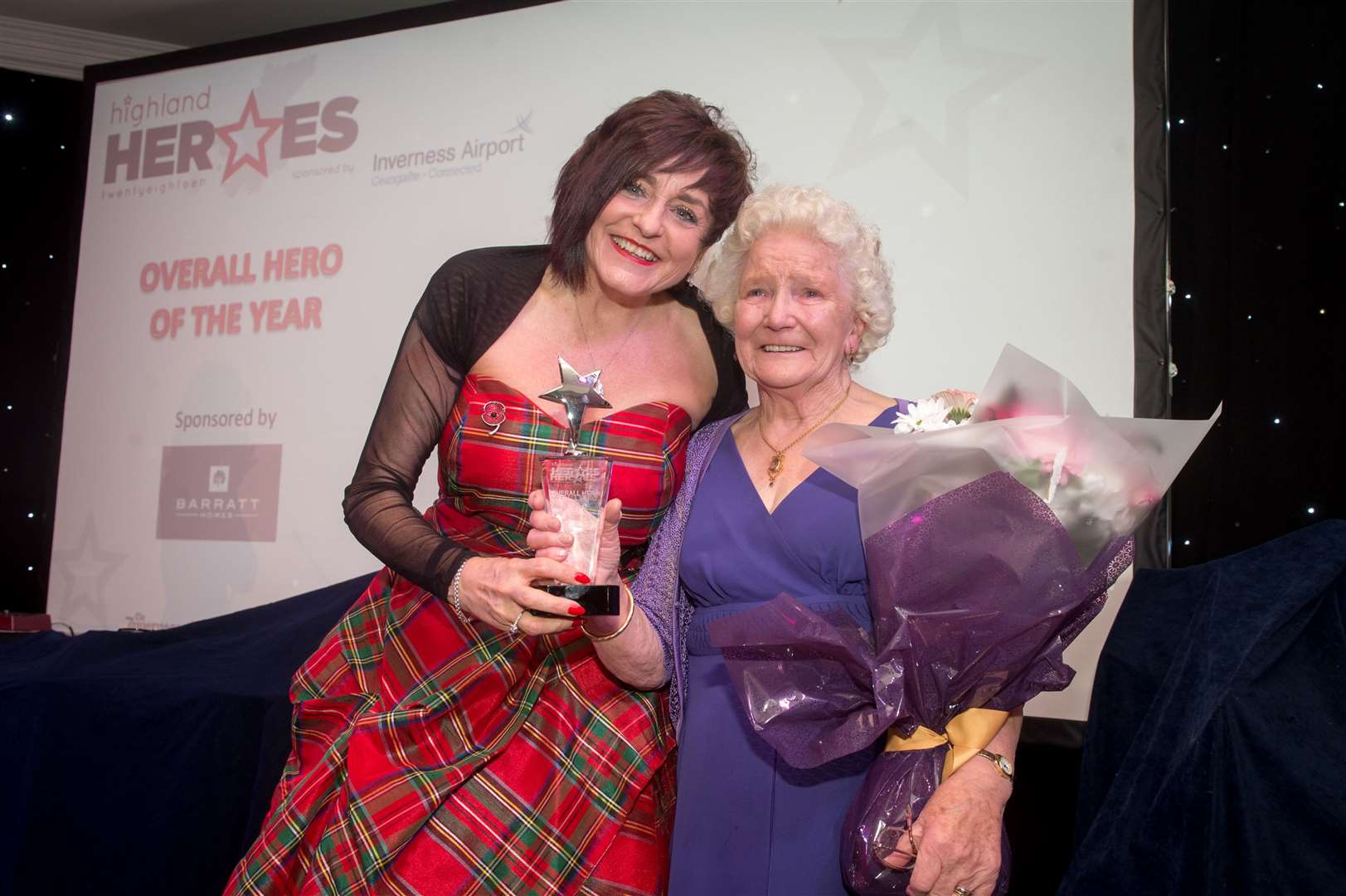 Jean Munro receiving the overall hero award as last year's Highland Heroes. Picture: Callum MacKay/SPP