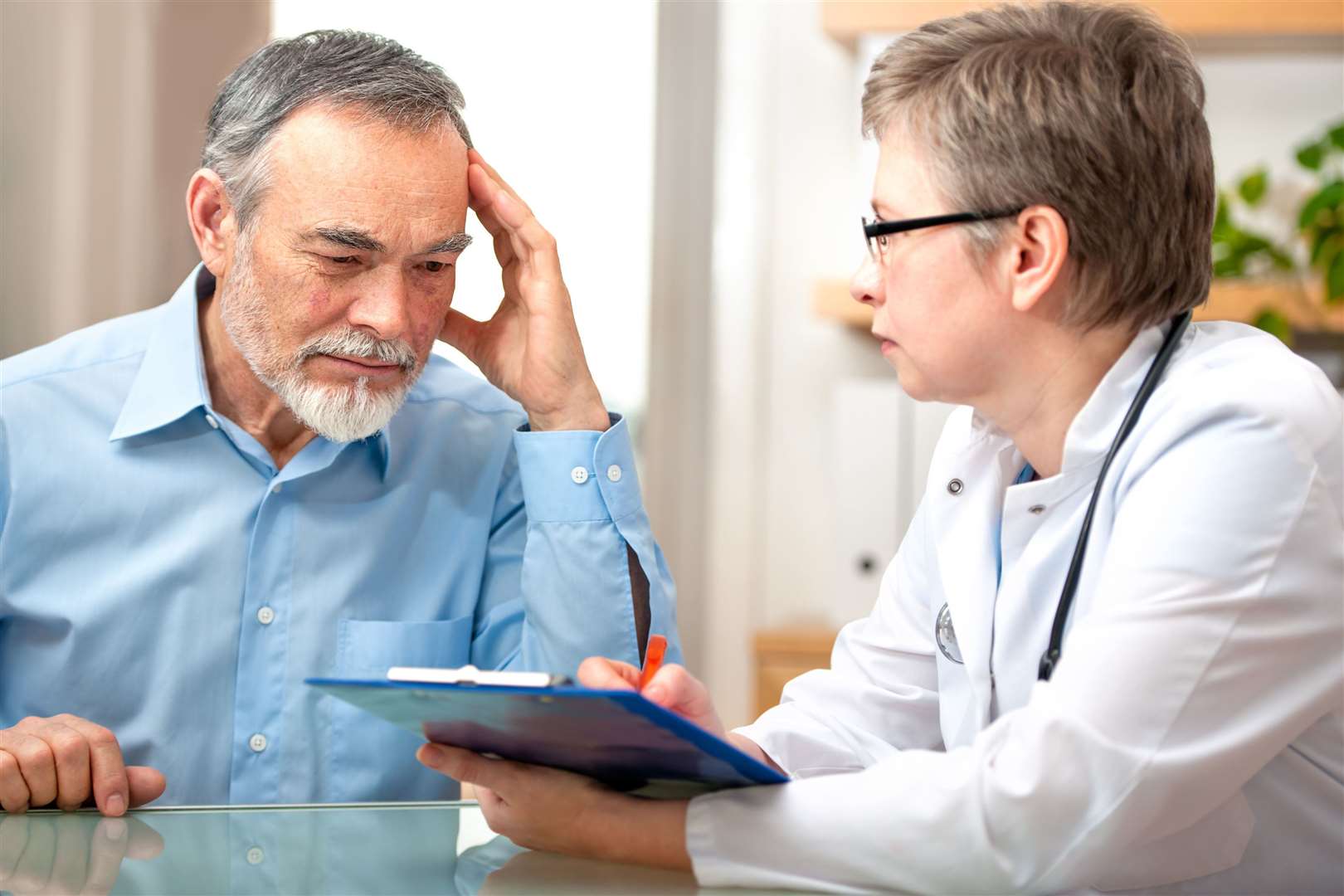 Undated Handout Photo of a man talking to a doctor. See PA Feature GARDENING Therapy. Picture credit should read: iStock/PA. WARNING: This picture must only be used to accompany PA Feature GARDENING Therapy..