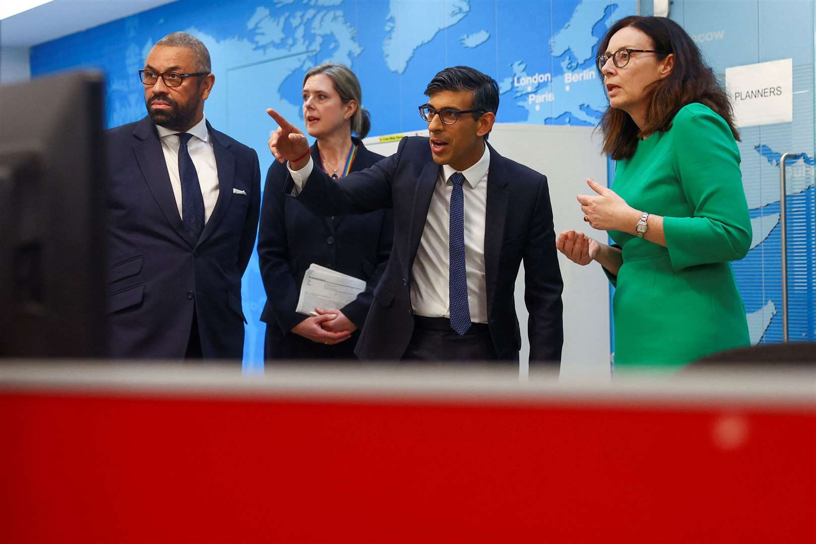 Prime Minister Rishi Sunak and Foreign Secretary James Cleverly meet Whitehall teams coordinating the evacuation of British nationals from Sudan (Hannah McKay/PA)